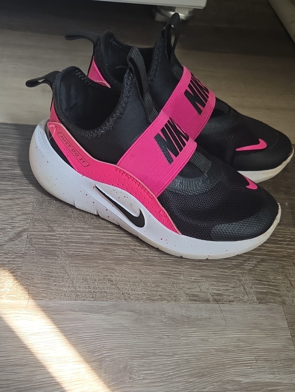 Nike Kids Black and Hot Pink Slip-On Sneakers